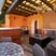 Rooftop terrace with view of sitting area, fire pit, kitchenette, jacuzzi